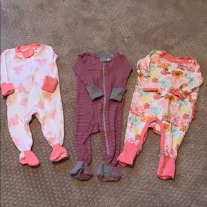 3 pairs of 0-3 month Burt’s bee’s footie pjs